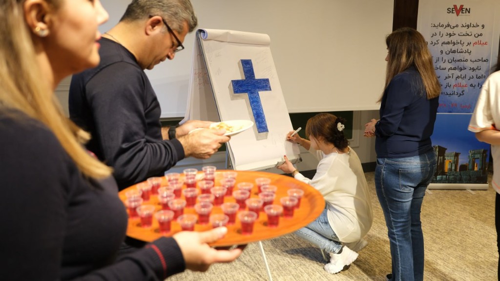 Believers in fellowship at the conference
